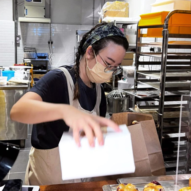 Sourdough artisan, Daphne Ng working at her baking kitchen.